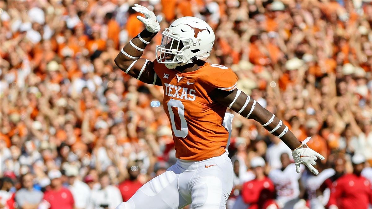 Dallas Cowboys select Texas LB DeMarvion Overshown with the No. 90