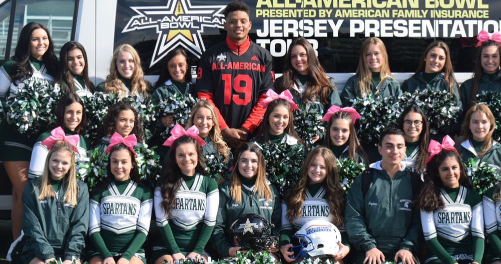 LA Rams safety John Johnson and cheerleaders hit the field with Hawaii youth