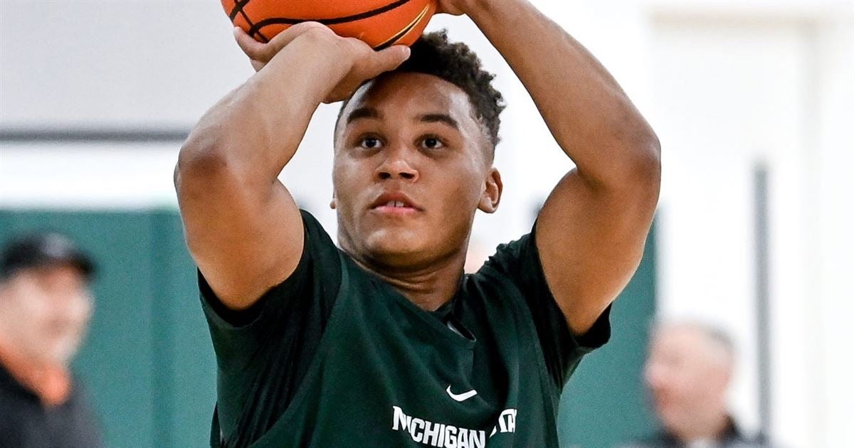Michigan State basketball Barry Sanders reacts to son, Nick, seeing