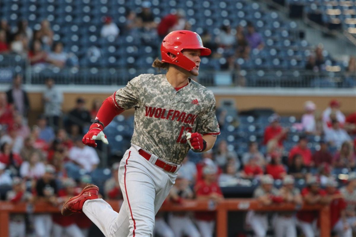 infielder Eli White (4) of the Clemson Tigers makes a bad throw to