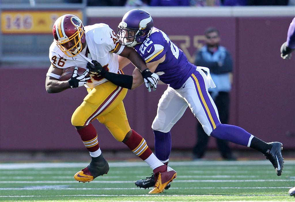 Running back Terry Allen of the Minnesota Vikings runs upfield