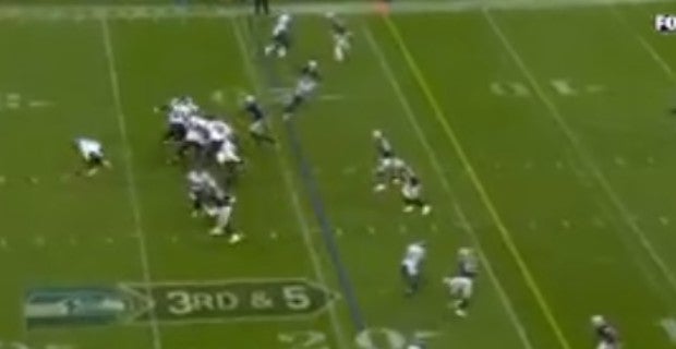 VIDEO: Russell Wilson Changes Play to Help David Moore Get $100k Bonus