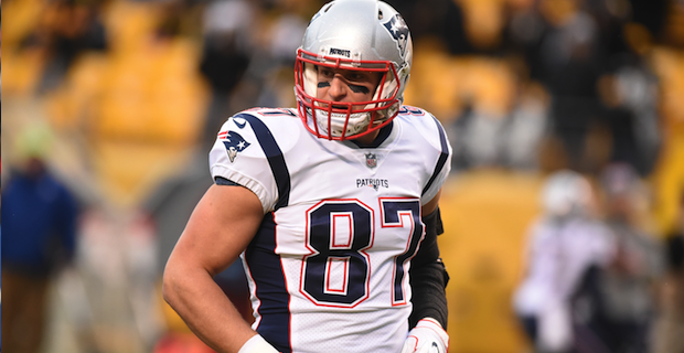 New England Patriots tight end Rob Gronkowski (87) finds open running room  against the Broncos on Sunday evening