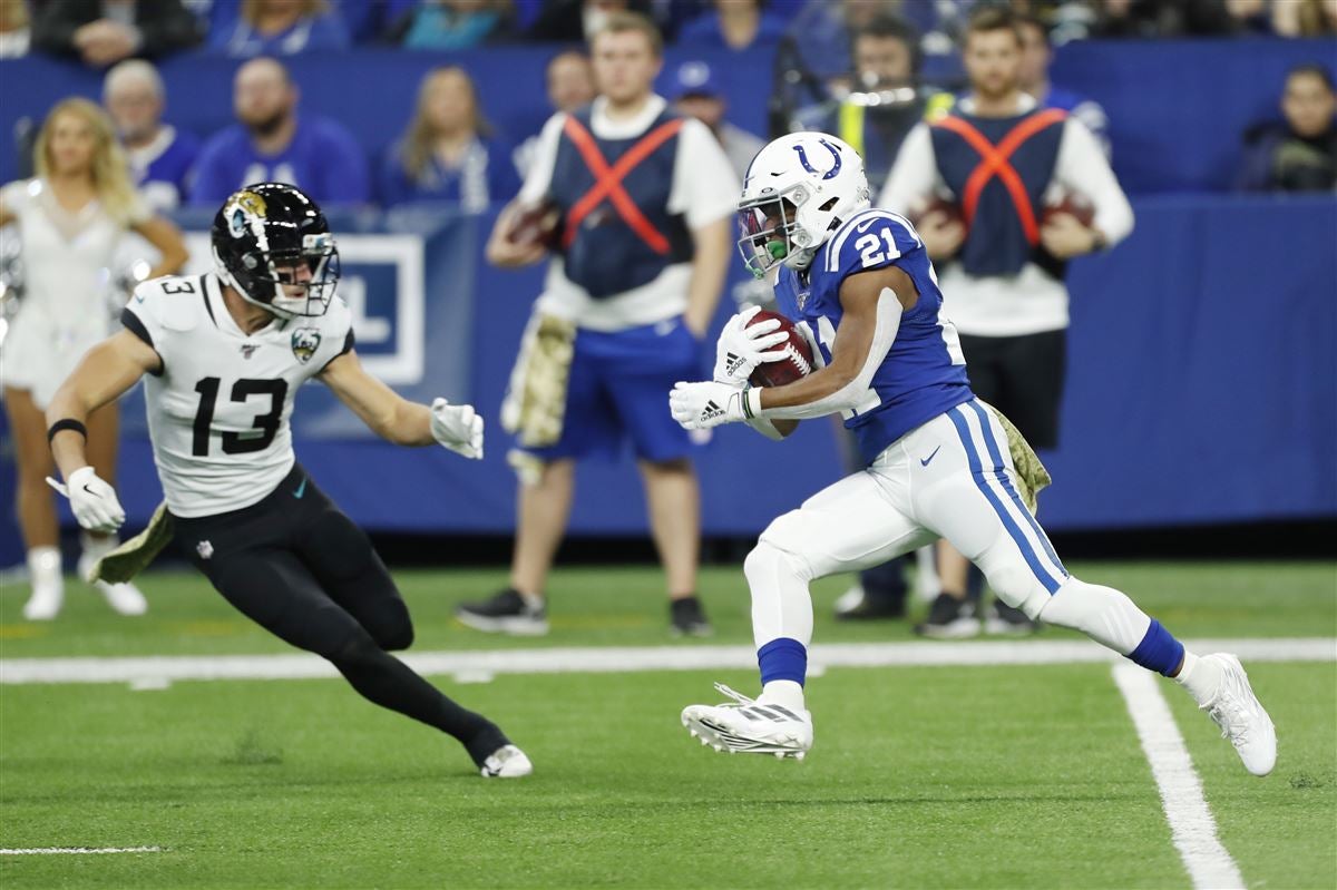 Washington Commanders wide receiver Kelvin Harmon (13) jogs onto the field  before an NFL preseason football game against the Carolina Panthers,  Saturday, Aug. 13, 2022, in Landover, Md. (AP Photo/Alex Brandon Stock