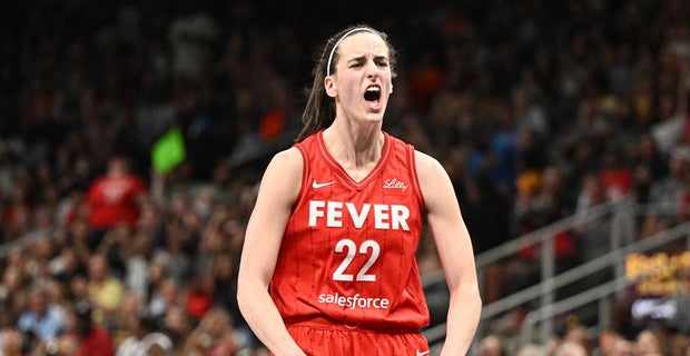 Caitlin Clark celebrating on the court during Indiana Fever game