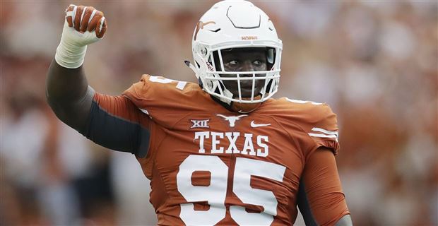 Texas tackle Poona Ford lands with Seahawks as a free agent