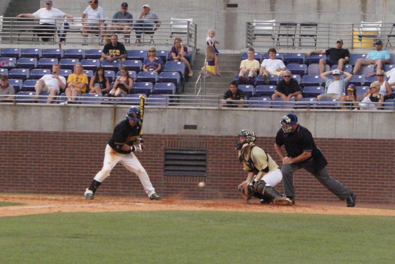 College baseball umpire pushes ECU player while he admires home run