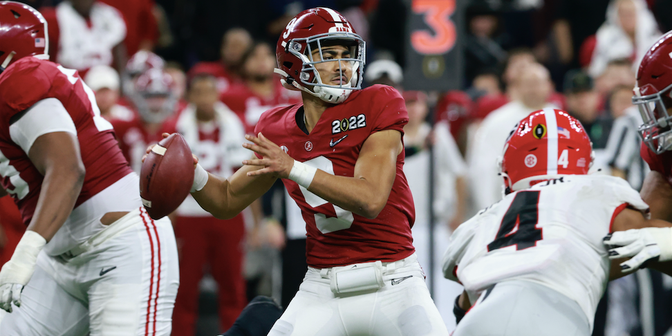 DeVonta Smith congratulates Alabama's Bryce Young for Heisman