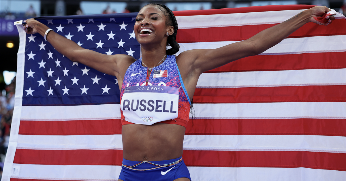 UK grad Masai Russell wins gold in 100m hurdles