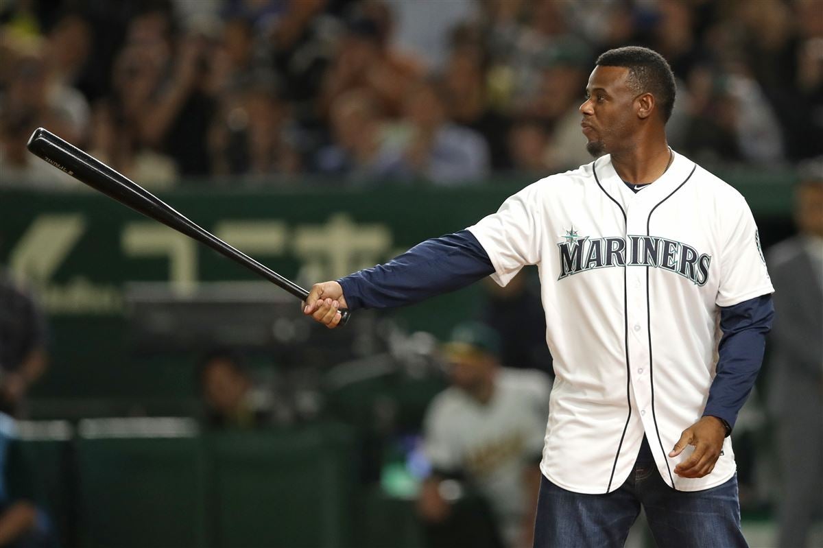 Alex Rodriguez and Ken Griffey,jr of the Seattle Mariners pose