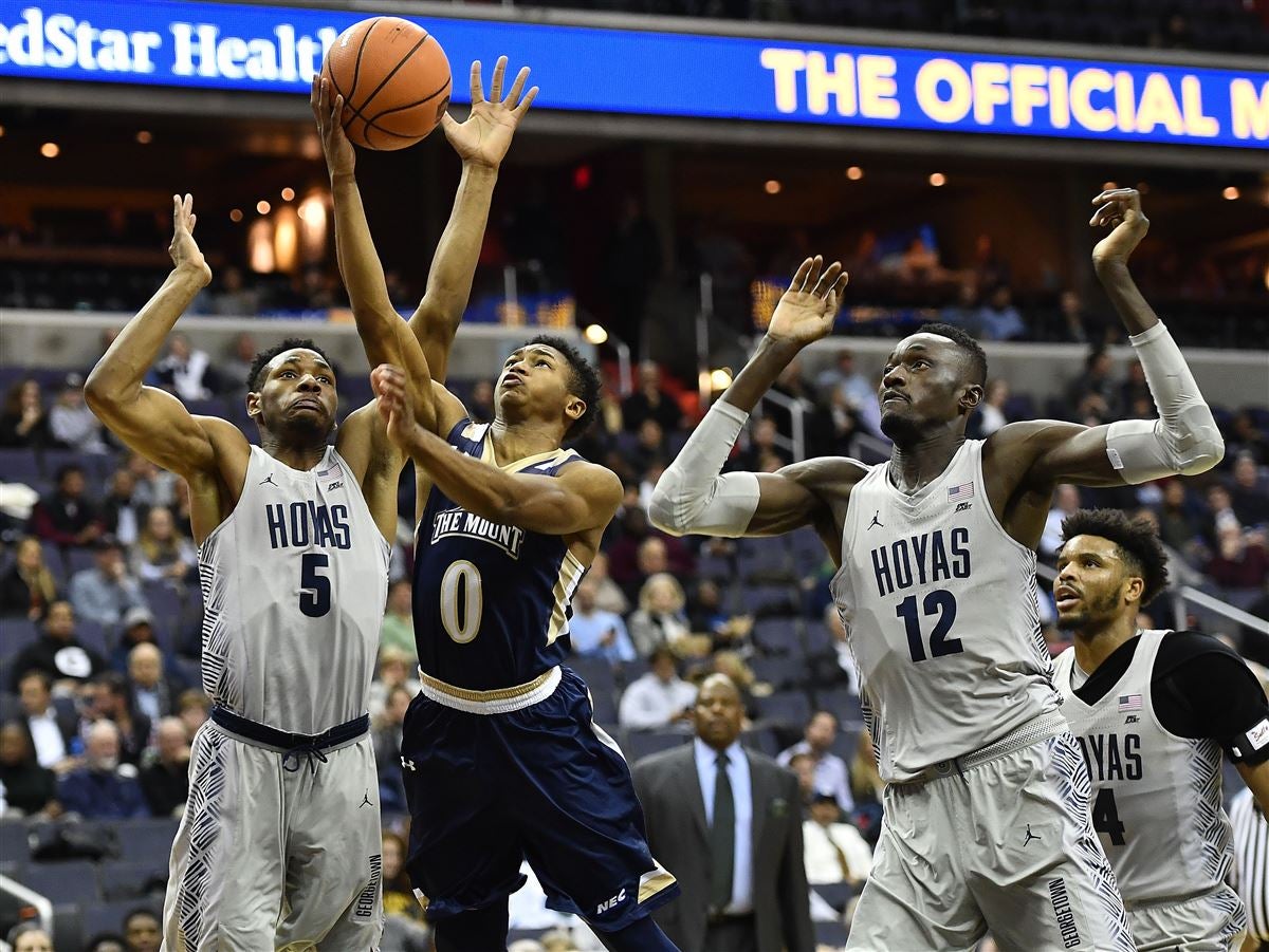 Georgetown Patrick Ewing in action,rebound vs North Carolina at