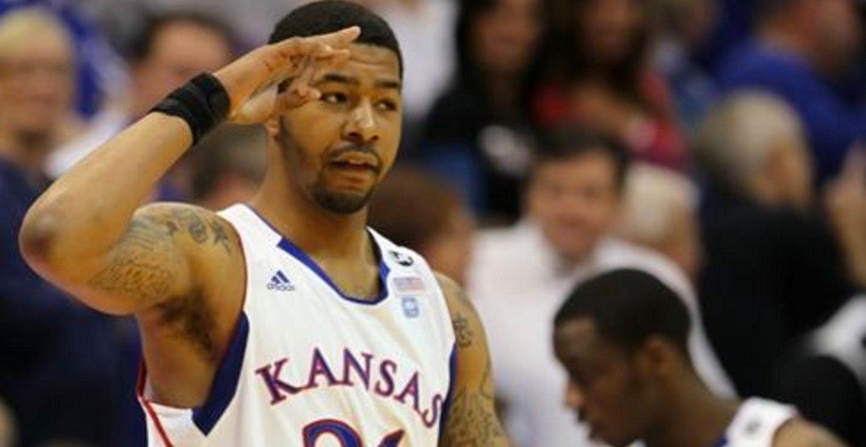 Kansas' Markieff Morris (21) with his twin brother Marcus Morris, left,  during the second half of an NCAA college basketball game against La Salle  Saturday, Dec. 12, 2009 in Kansas City, Mo. (