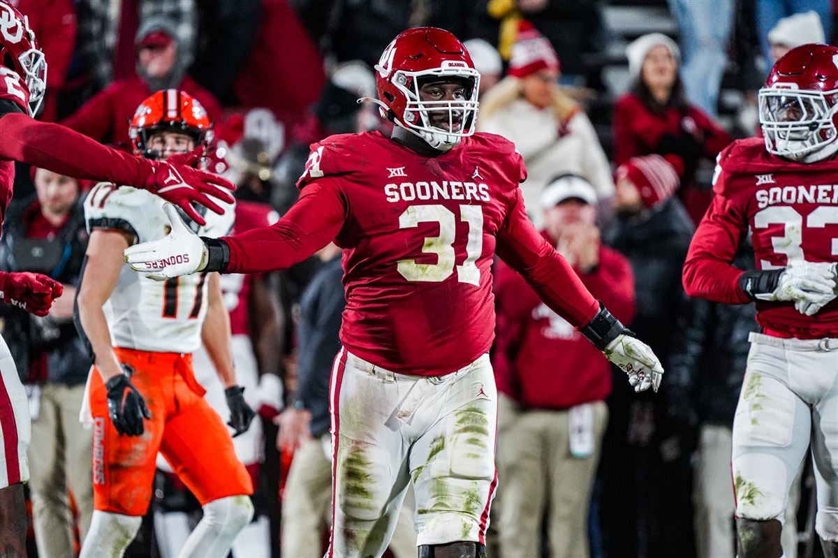 Oklahoma defensive lineman Jalen Redmond (31) celebrates after returning a  fumble for a touchdown against Iowa State during the first half of an NCAA  college football game Saturday, Nov. 20, 2021, in Norman, Okla. (AP  Photo/Alonzo Adams Stock Photo