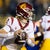 Jaxson Dart, Michael Trigg pose in Oklahoma uniforms during visit