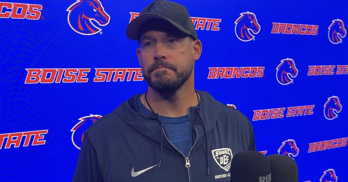 Boise State defensive coordinator Erik Chinander talks with the media after fall camp practice Thursday