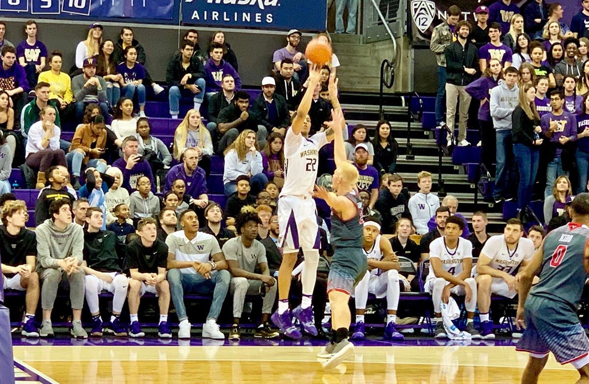 Southern Huskies basketball team viewing Northern hunting ground