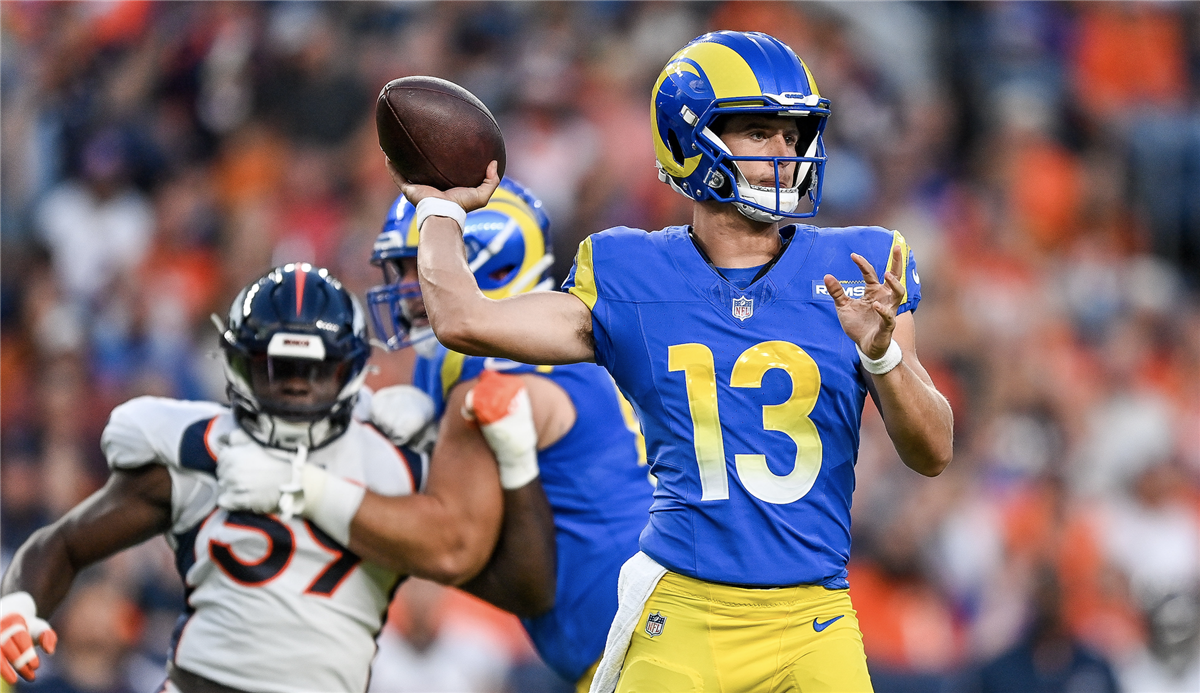 Los Angeles Rams quarterback Stetson Bennett (13) passes the ball