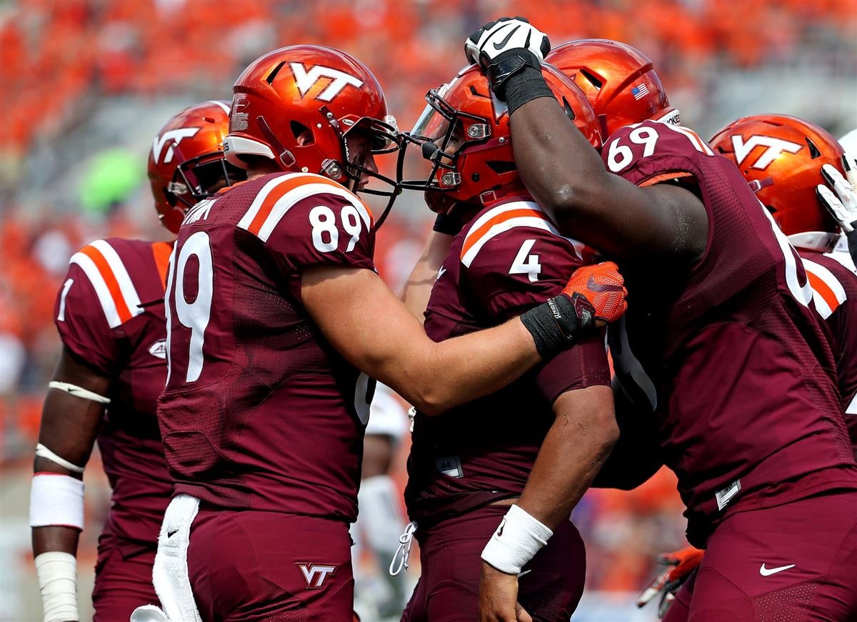 Marcus Vick carries double burden at Va. Tech