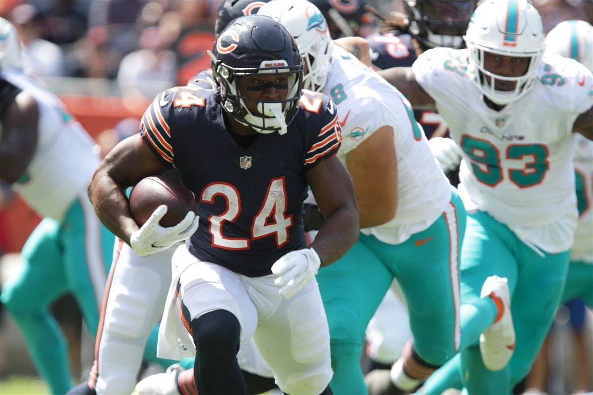 Chicago Bears running back Khalil Herbert (24) warms up prior to