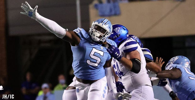 September 24, 2022: North Carolina Tar Heels defensive lineman Travis Shaw  (4) hypes up the student