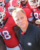 Georgia Bulldogs tight end Marlon Brown (15) is gang-tackled by