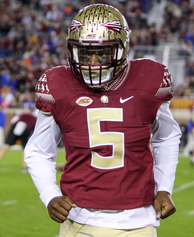 Florida State linebacker Dontavius Jackson (5) heads out to an