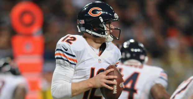 Chicago Bears quarterback Rudy Bukich is about to loose his jersey