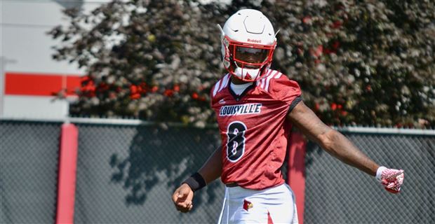 Lamar Jackson Louisville Cardinals Unsigned White Jersey Warming Up vs. NC  State Photograph