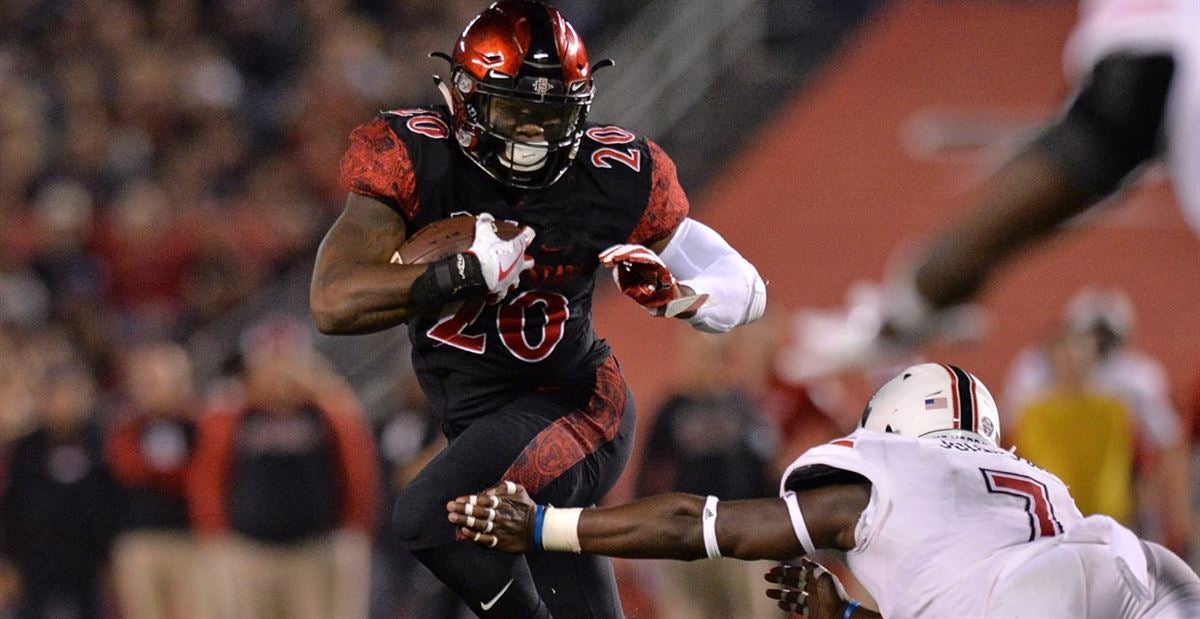 Rashaad Penny poked in eyes by Northern Illinois LB in dogpile - Sports  Illustrated
