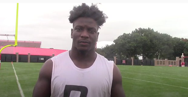 Rutgers football alum Olakunle Fatukasi and Blessuan Austin sign