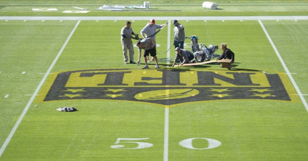 Broncos colors, logo painted in both Super Bowl end zones