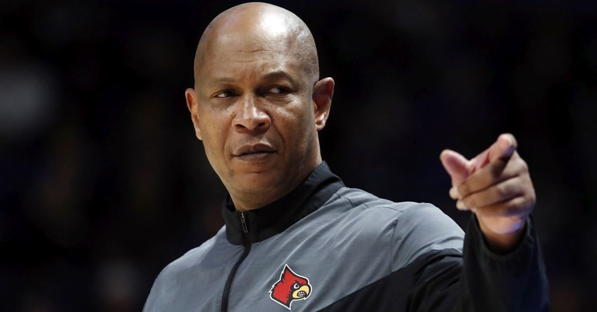 Fired Louisville basketball coach Kenny Payne took aim at Cardinals