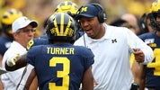 Michigan OC Josh Gattis breaks down quarterback competition Michigan OC Josh Gattis breaks down quarterback competition