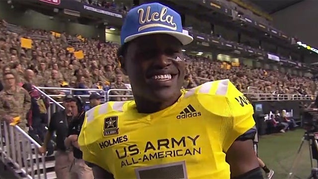 Darnay Holmes gets Army All-American jersey by day, stars on field