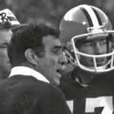 Cleveland Browns coach Sam Rutigliano hugs Cleveland quarterback