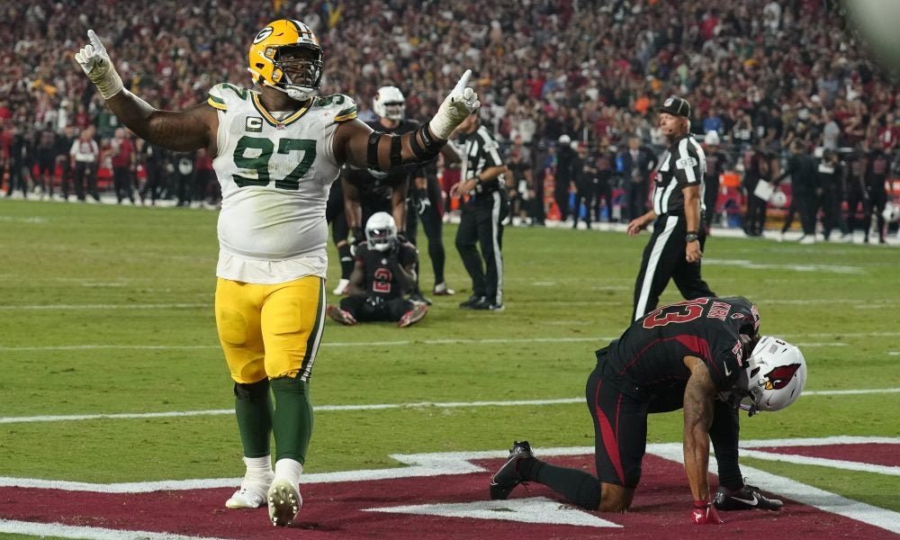 Packers' Amari Rodgers slams into presumably Rashan Gary on