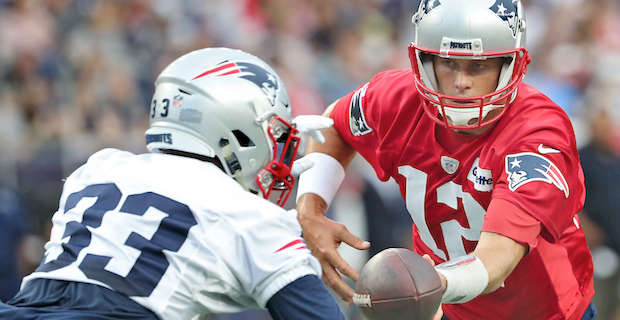 Foxborough, Massachusetts, USA. 08th Sep, 2019. New England Patriots  quarterback Tom Brady (12) yells to fans while running out on to the field  prior to the game against the Pittsburgh Steelers at