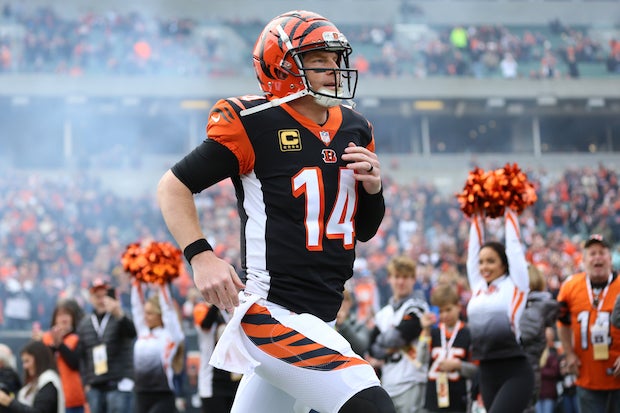 Andy Dalton offers Joe Burrow advice as he passes Bengals torch