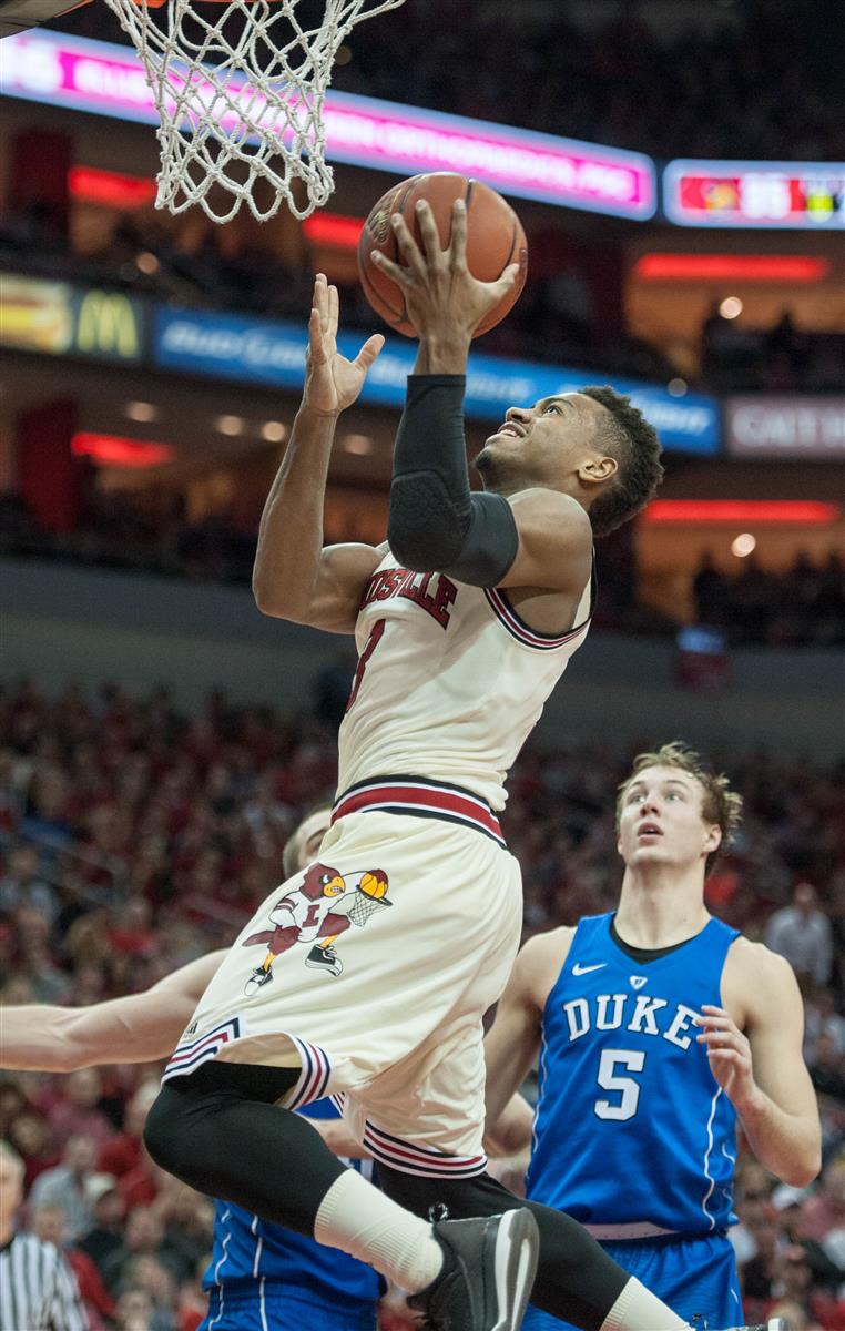 Louisville Cardinals guard Trey Lewis (3) dribbles the ball up the court  during the NCAA basketball game between Louisville and Clemson on Sunday,  January 10, 2016 at Bon Secours Arena in Greenville