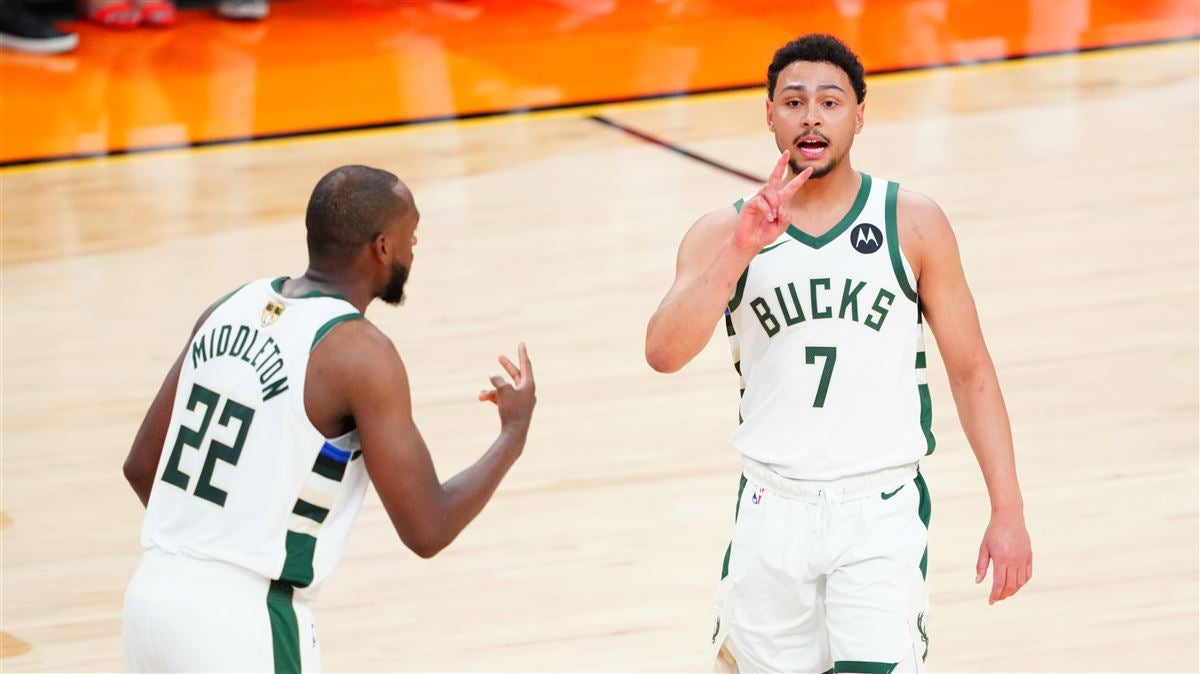 Jul 8, 2021; Phoenix, Arizona, USA; Milwaukee Bucks guard Bryn Forbes (7) and forward Khris Middleton (22) against the Phoenix Suns in game two of the 2021 NBA Finals at Phoenix Suns Arena. Mandatory Credit: Mark J. Rebilas-USA TODAY Sports