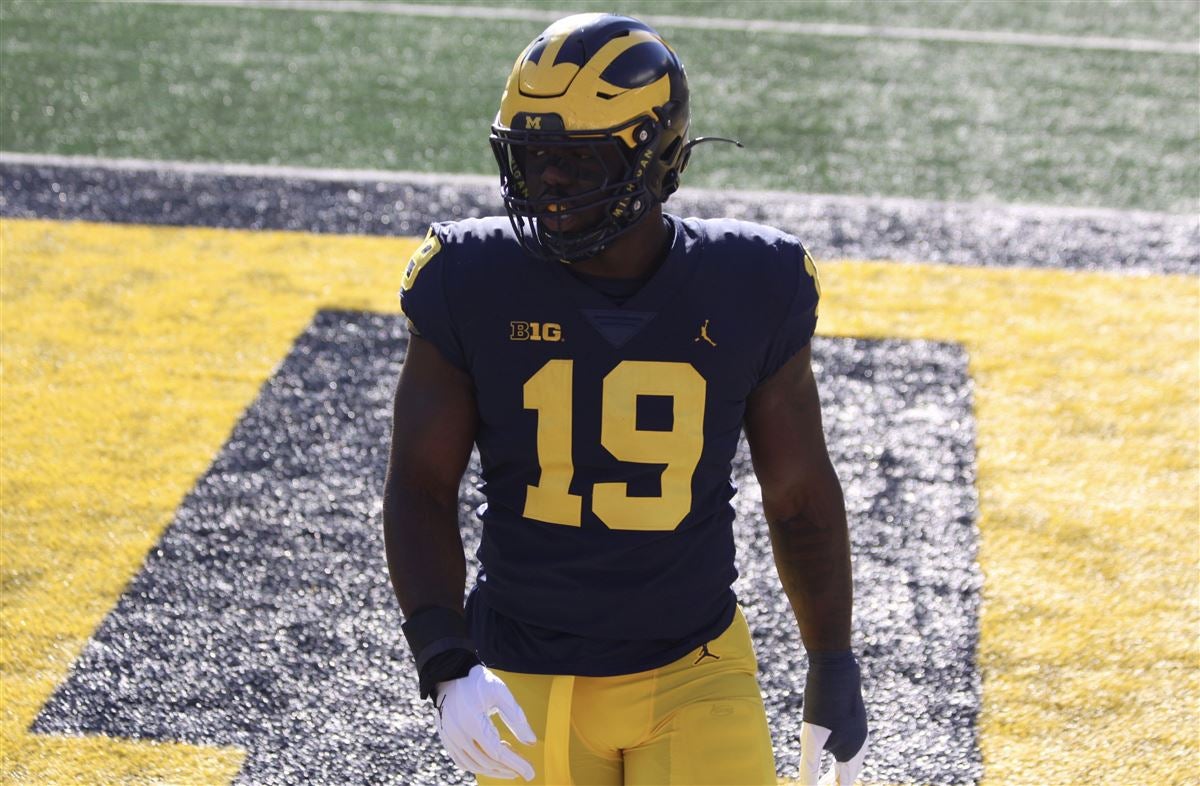 Michigan's Kwity Paye has career-best game but leaves with injury 