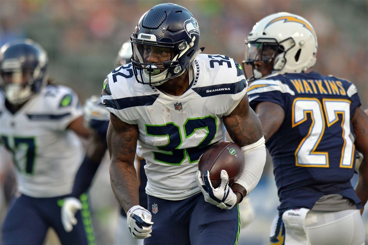 Seattle Seahawks' running back Chris Carson takes part in an NFL training  session at the Grove Hotel in Chandler's Cross, Watford, England, Thursday,  Oct. 11, 2018. The Seattle Seahawks are preparing for