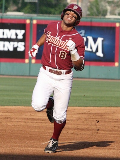 Former Boynton Beach little league star Devon Travis soaks in