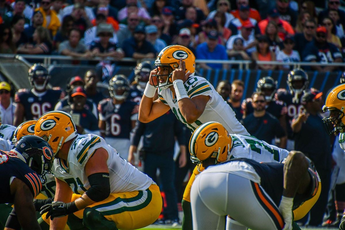 Green Bay Packers linebacker Ray Nitschke (66) lowers his head, as