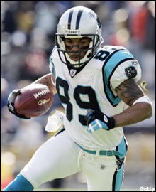 Carolina Panthers' running back DeShaun Foster puts his hand to the News  Photo - Getty Images