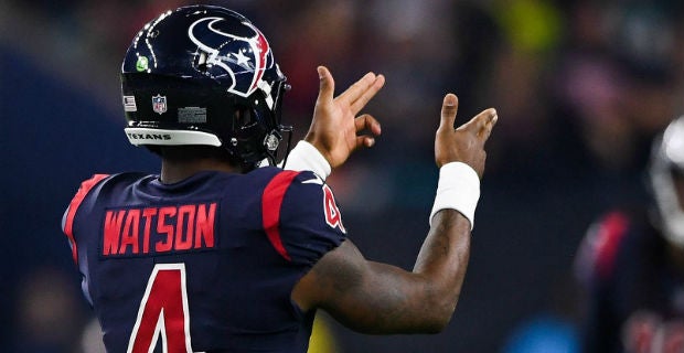 Cleveland Browns DESHAUN WATSON (4) escapes Houston Texans defenders during  the game between the Cleveland Browns and the Houston Texans in Houston,  Texas at NRG Stadium on December 4, 2022. The Cleveland