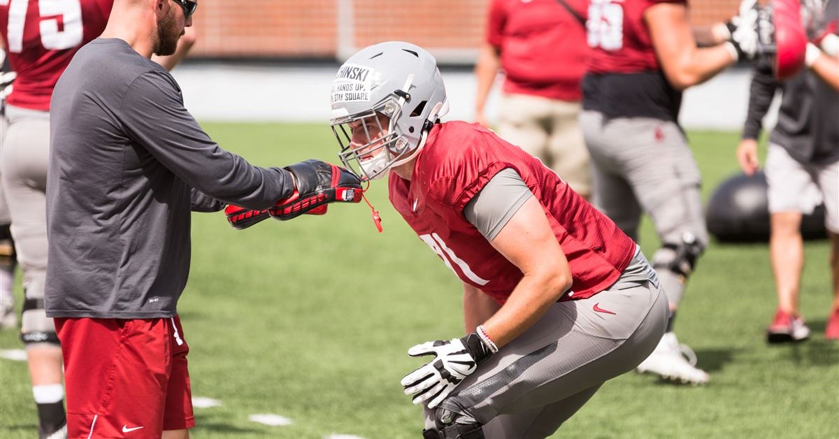 Two WSU football players, Davis Jr. and Utschinski, medically retire