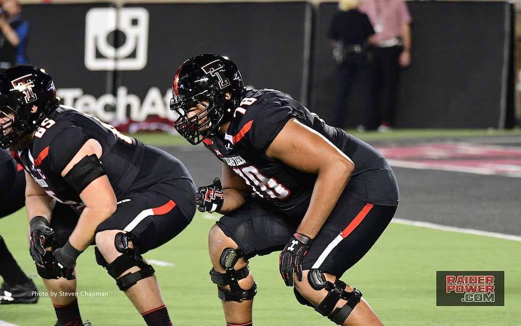 Patrick Mahomes Texas Tech Red Raiders Unsigned White Jersey Running with Ball vs. West Virginia Photograph