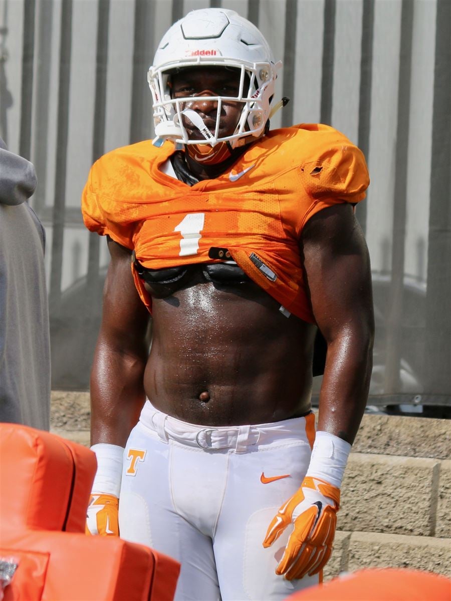 Denver Broncos linebacker Jonathan Kongbo (90) walks off the field