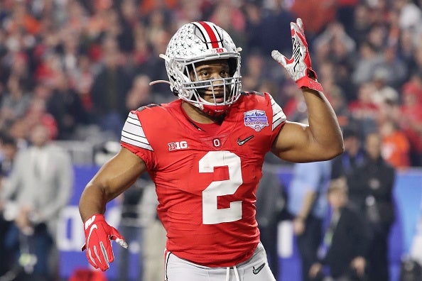 Former Ohio State football star J.K. Dobbins wore Michigan shirt